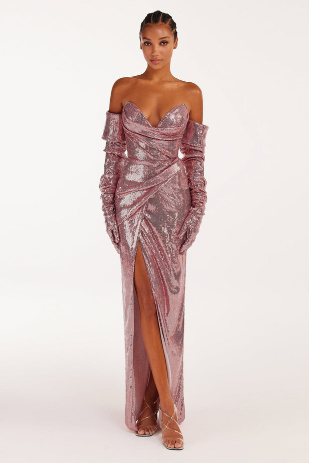 Sequined strapless evening gown in rose color with a thigh slit