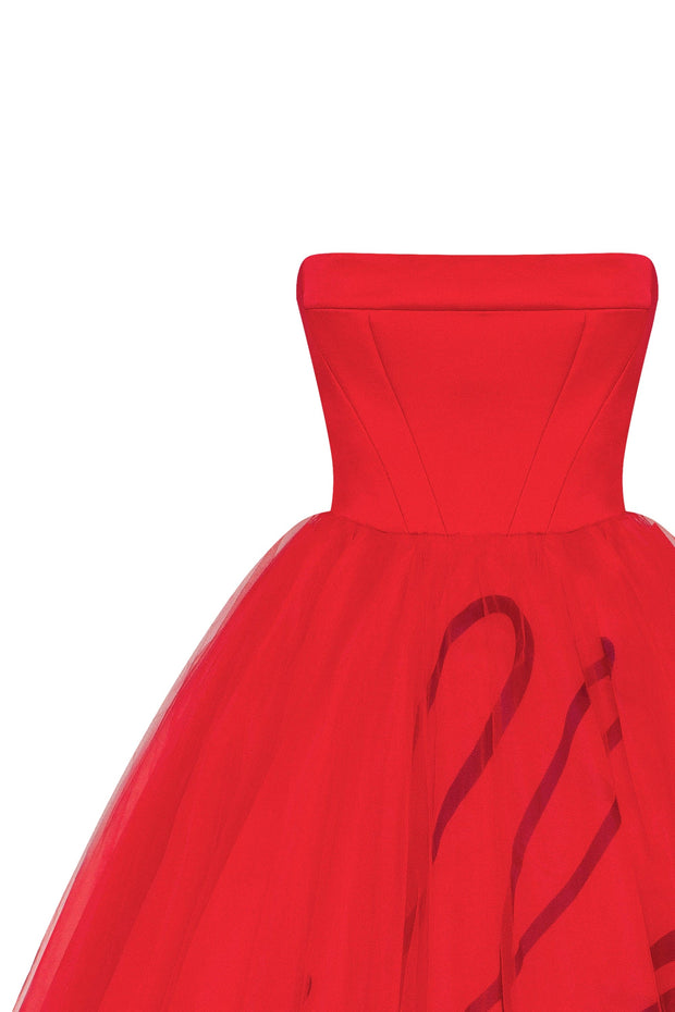 Dramatic red organza dress adorned with Milla's signature and black gloves, Xo Xo