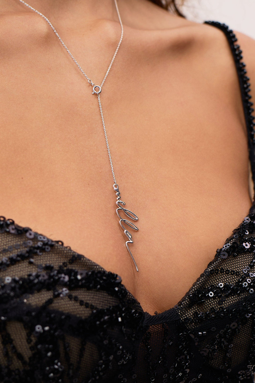 Lariat necklace with Milla's signature