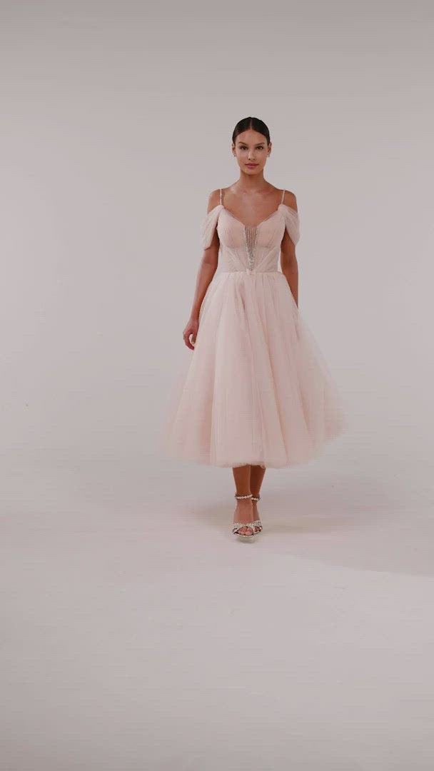 Feminine tulle cocktail dress with the light off-the-shoulder sleeves