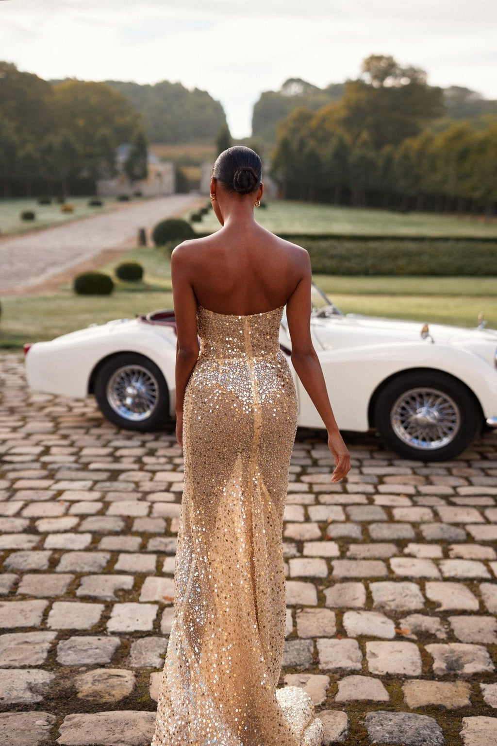 Showstopper maxi dress covered in gold sequins - Milla